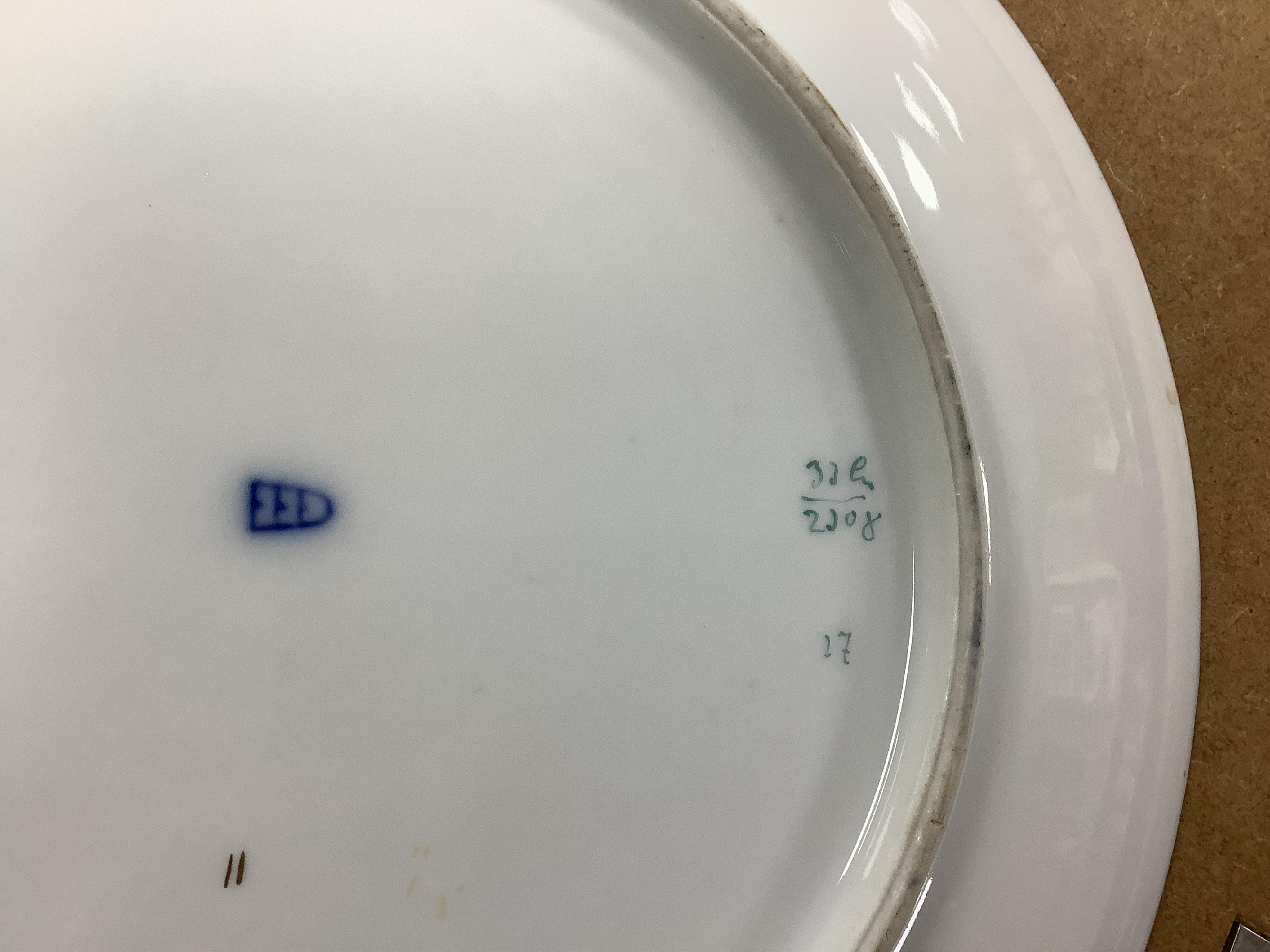 A pair of Vienna style porcelain chargers, early 20th century, 33cm